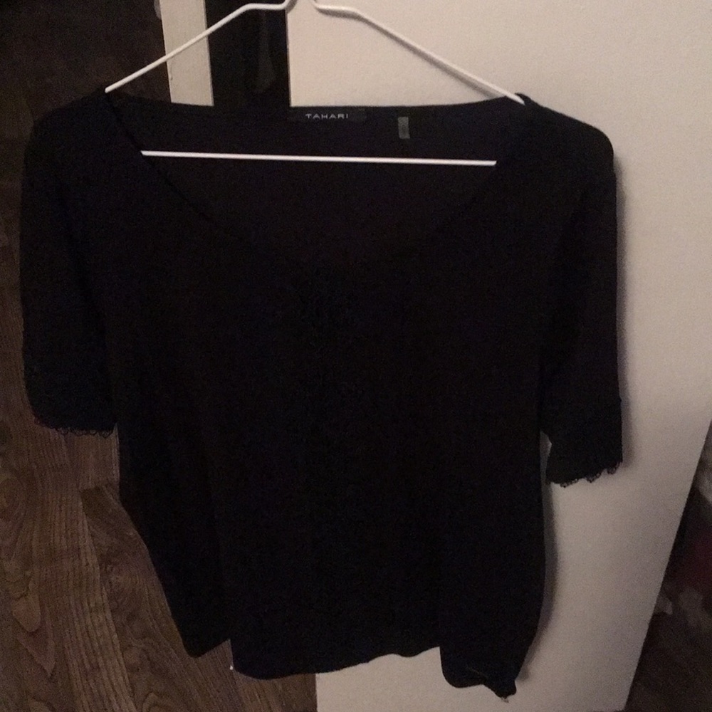 Tahari short sleeve top with embroidered design. Worn once excellent condition.